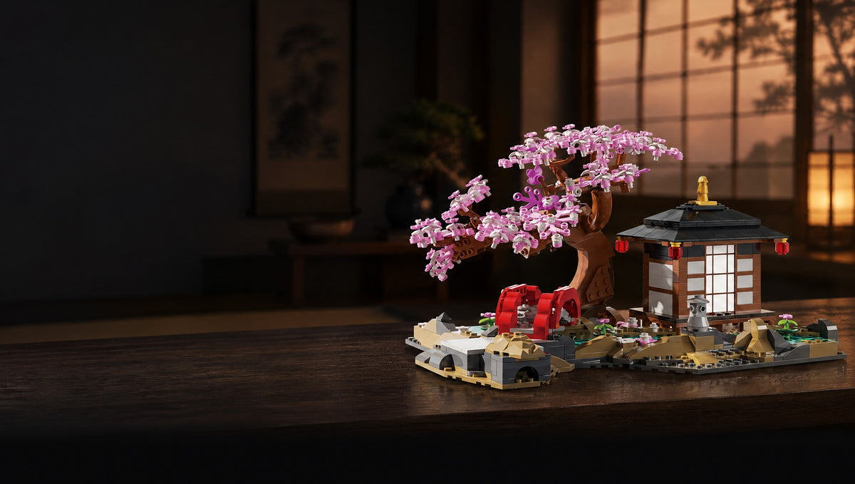 Pink blossom over a quiet Japanese courtyard