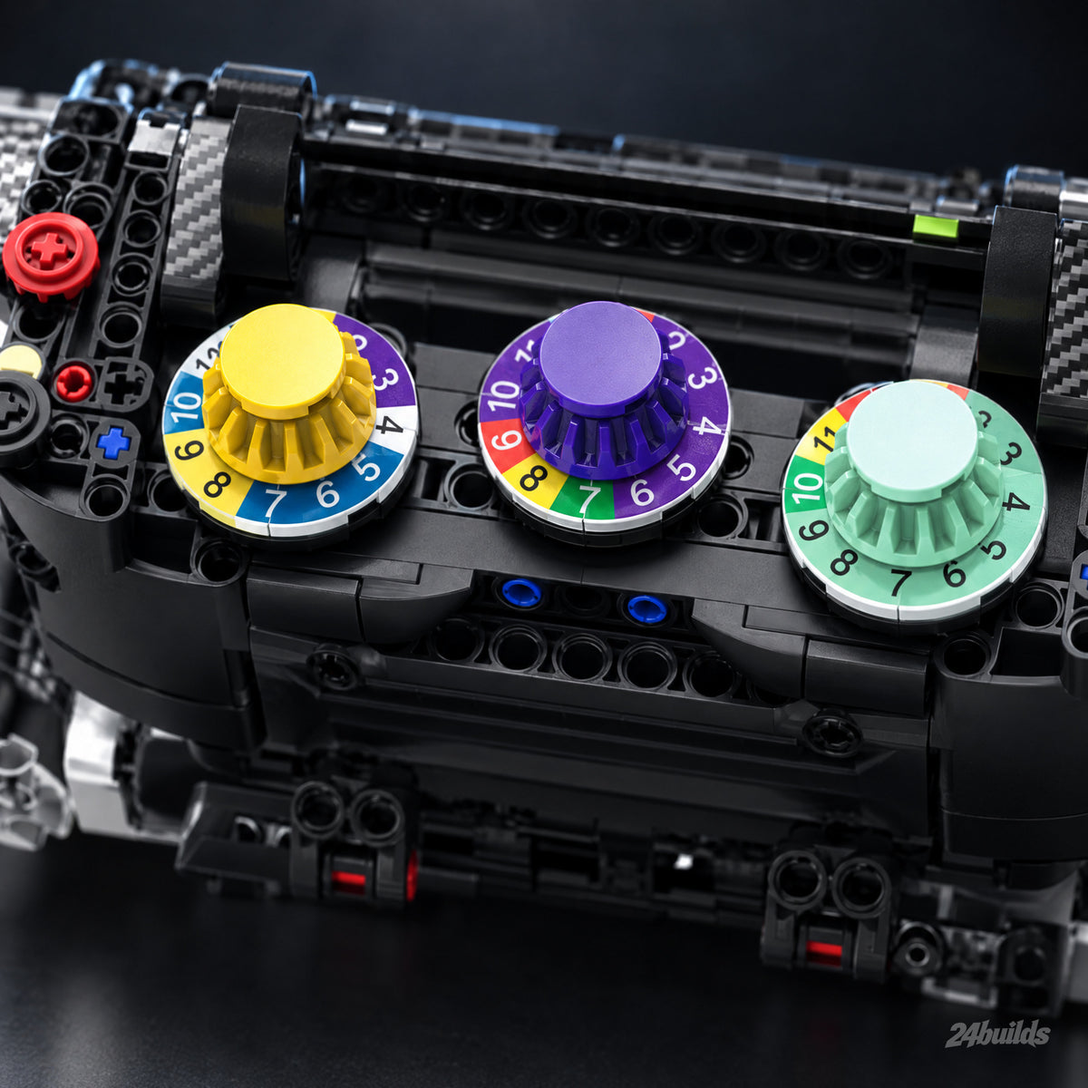 German Grand Prix Steering Wheel: yellow, purple and mint rotary dials