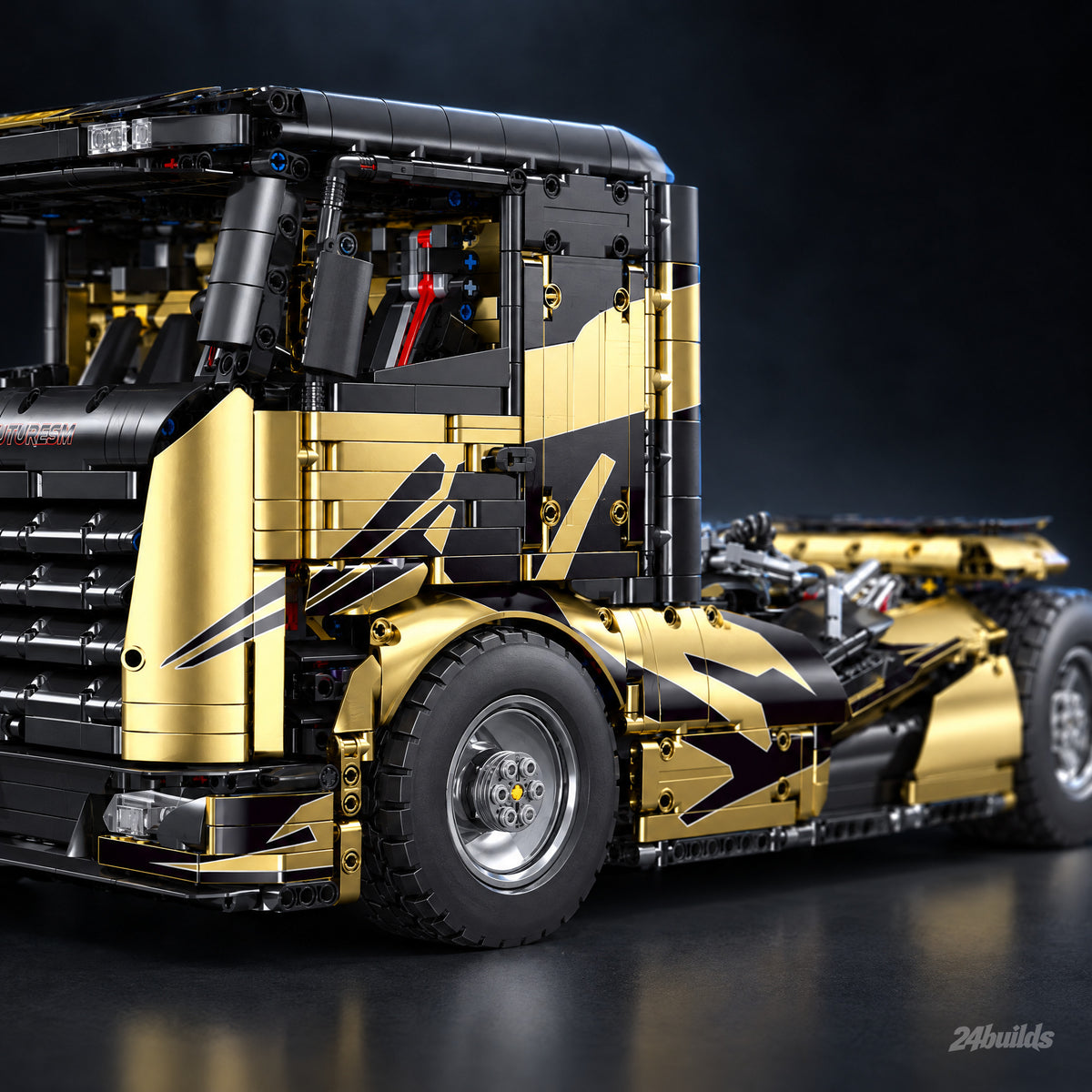 Gold Edition V8 Heavy-Duty Truck brick model, gold and black side panels