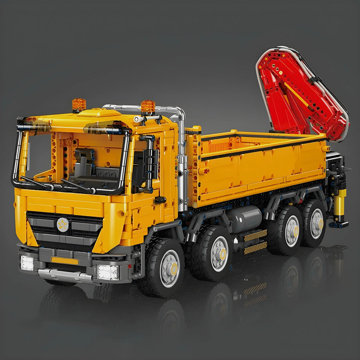 A knuckle boom crane on a tipping truck