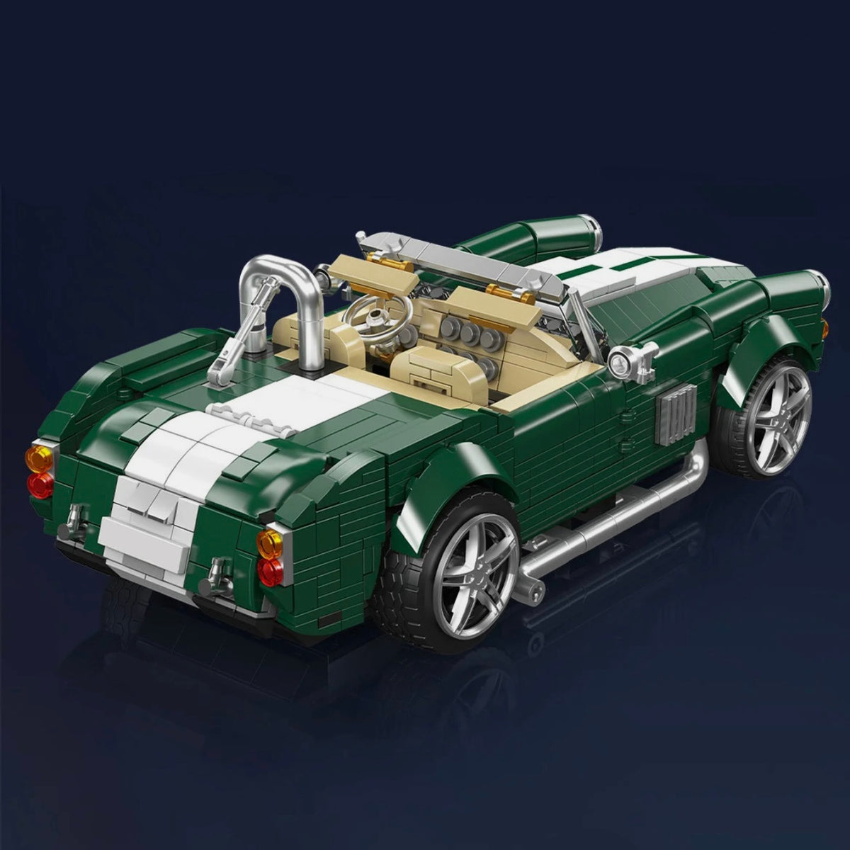 Chrome side exhausts on an open-top roadster