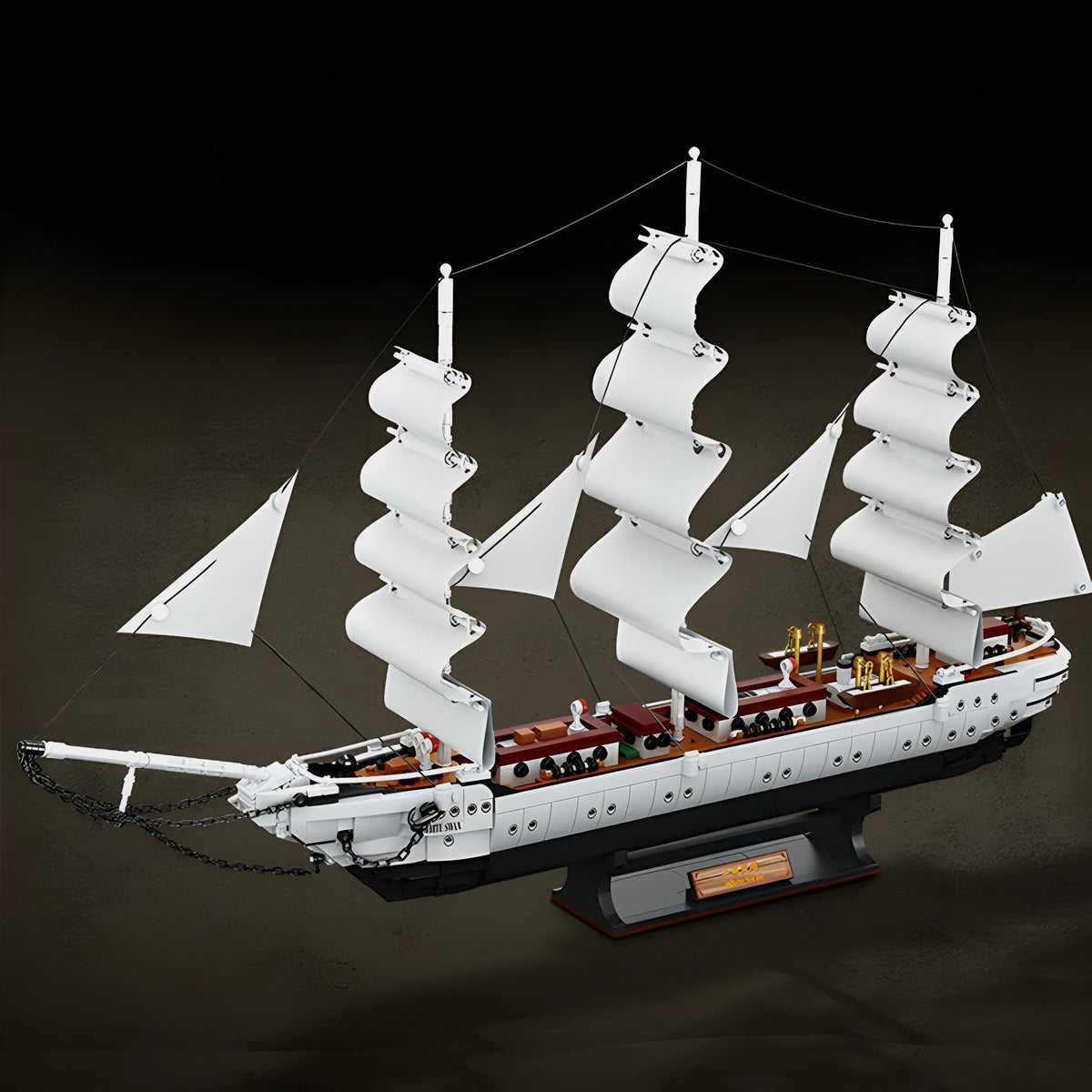 White sails and removable cabins on a curved hull
