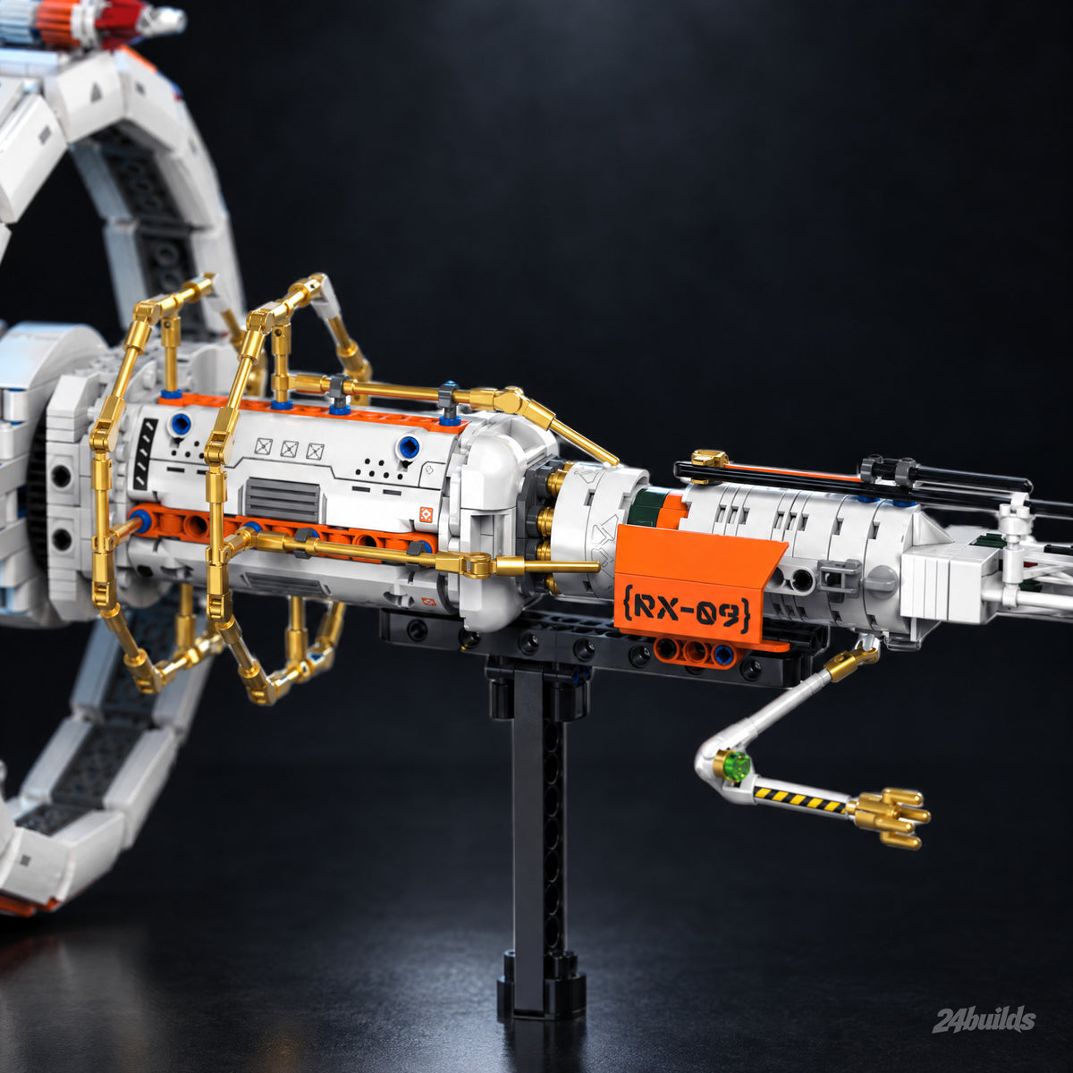 Genesis Star Station: gold truss frame and orange module close-up