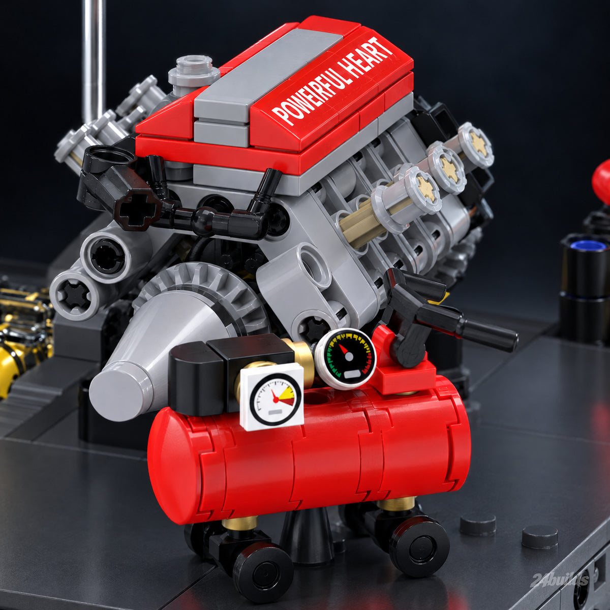 Hot Hatch Tuning Garage brick model, red engine on its stand with the tyre inflator