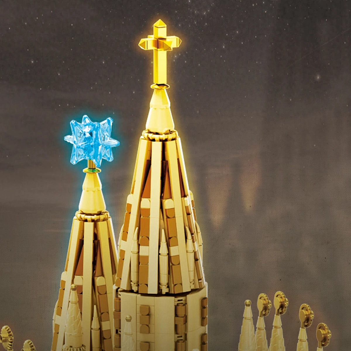 Sagrada Família brick model, cross and star tower tops close-up