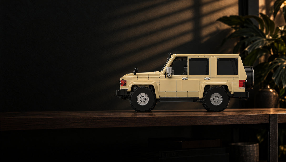 A beige Land Cruiser 78 with a safari roof