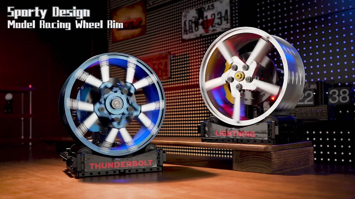 Motorised wheel hub brick models turning on their display bases