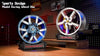 Motorised wheel hub brick models turning on their display bases
